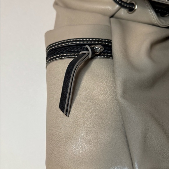Stylish Tan and Black  Backpack purse in like new condition - Picture 6 of 10